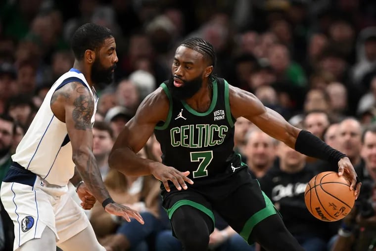 Jaylen Brown #7 of the Boston Celtics drives to the basket against Kyrie Irving #11 of the Dallas Mavericks during the first quarter at the TD Garden on March 01, 2024 in Boston, Massachusetts. (Photo by Brian Fluharty/Getty Images)