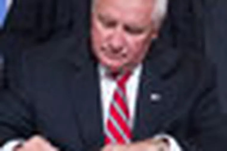 Pennsylvania Governor Tom Corbett signs the 2012-13 state budget during a ceremony in the Capitol Rotunda late Saturday June 30, 2012. (AP Photo/Joe Hermitt, The Patriot-News)