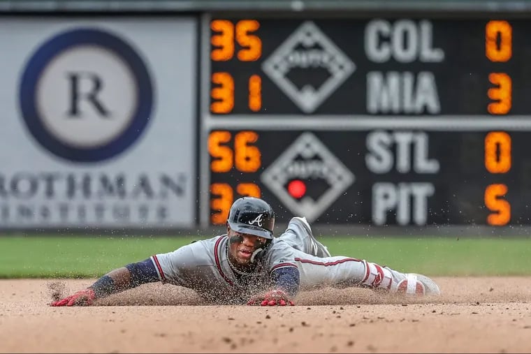 Atlanta’s  Ronald Acuna Jr. slipped rounding second base in the seventh inning. Acuna, 20, is hitting .421.