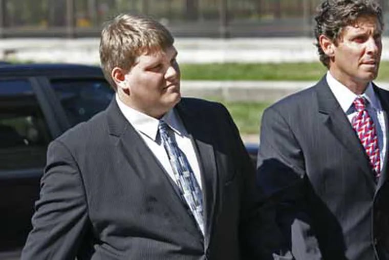 Matthew Clemmens, 21, of Cherry Hill, arrives with attorney at Family Court in Philadelphia for sentencing in relation to vomiting on an off duty police officer at a Phillies game.  (Alejandro A. Alvarez / Staff Photographer)