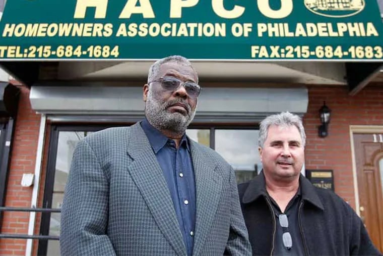 Victor Pinckney (left), a vice president of the landlord association HAPCO Philadelphia, with Jim Sims, a HAPCO board member, in a file photo. Pinckney commended the city for its loan program to help small landlords through the coronavirus pandemic but said it's not enough.