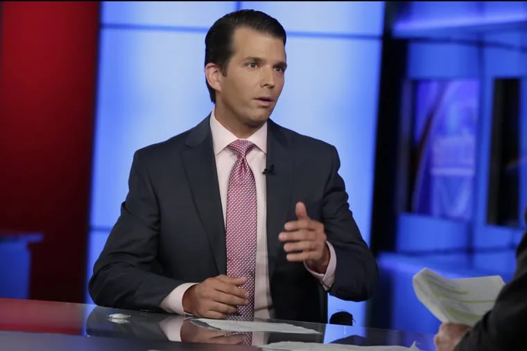 Donald Trump Jr. is interviewed by host Sean Hannity on his Fox News program in New York on July 11.