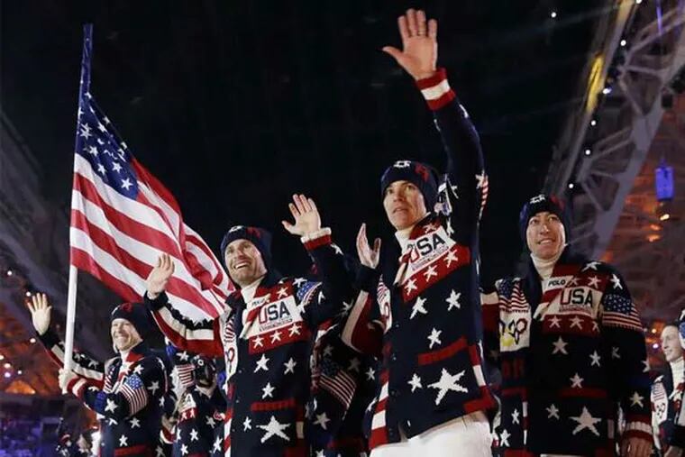 Team USA arrives at the opening ceremony of the 2014 Winter Olympics in Sochi, Russia.