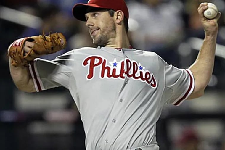 Cliff Lee, beating the Mets on Monday, is 6-2 with a 2.50 ERA since the start of July. (Kathy Willens/AP)