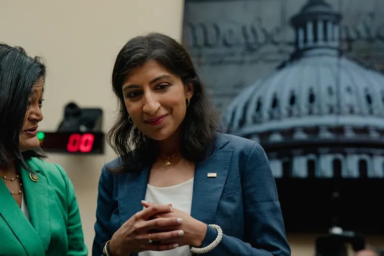 Federal Trade Commission Chair Lina M. Khan, right, with Rep. Pramila Jayapal (D-Wash.) on Capitol Hill in July. “Noncompete clauses keep wages low, suppress new ideas, and rob the American economy of dynamism," Khan said in a statement after the announcement that the FTC would ban noncompetes.