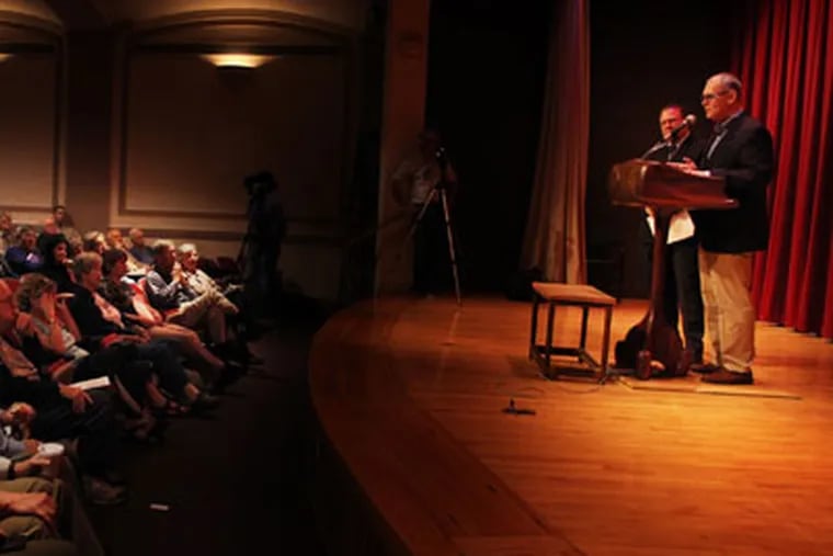 Wendell Potter speaks to supporters at the Free Library of Philadelphia on Saturday. The event was billed as a "Town Hall Meeting" however, questions from the audience were pre-screened and delivered by a moderator. (Laurence Kesterson / Staff Photographer)