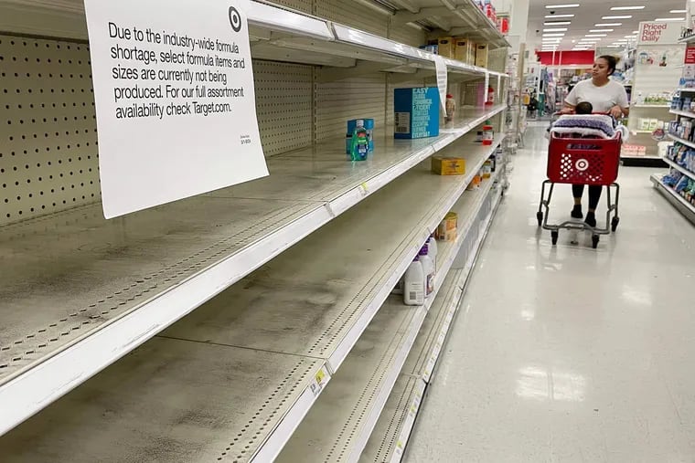 Empty shelves where baby formula normally would be stocked at a Target in Annapolis, Md., in May 2022.