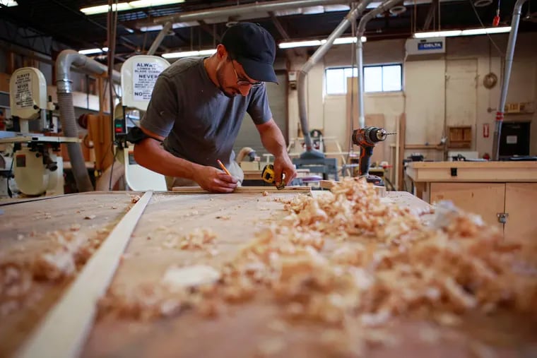 Caleb Jones, who has been working with wood since age 8, uses the equipment at Philadelphia Woodworks in Manayunk to do his home improvement projects.