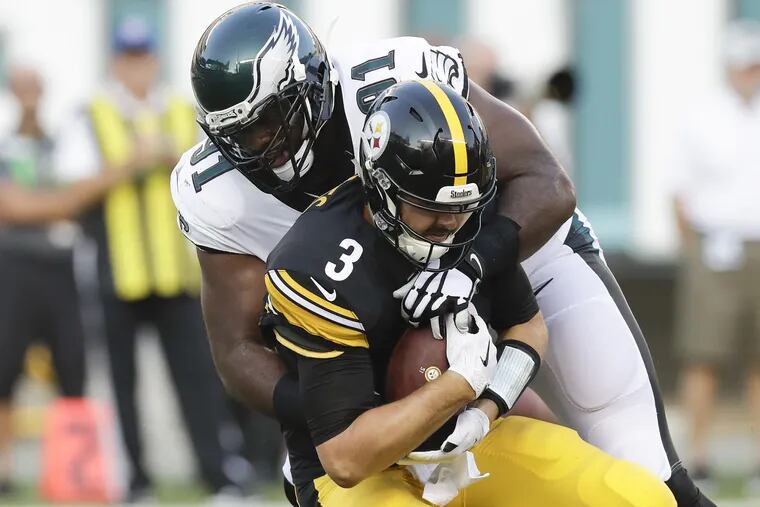 Eagles defensive end Fletcher Cox sacks Pittsburgh Steelers quarterback Landry Jones during the first-quarter in a preseason game on Thursday, August 9, 2018 in Philadelphia.