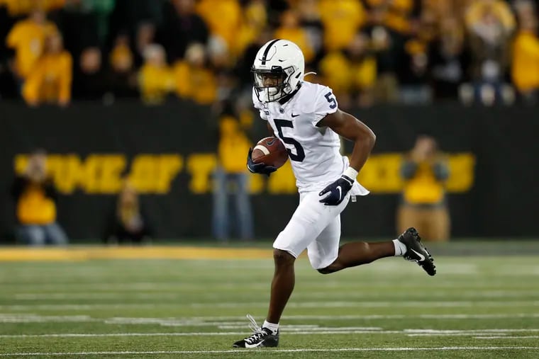 Penn State wide receiver Jahan Dotson gains yards in the Nittany Lions' win over Iowa.