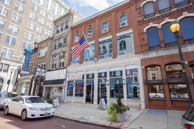 Five properties in the 700 block of Sansom St. would be demolished for a residential tower under the plan.