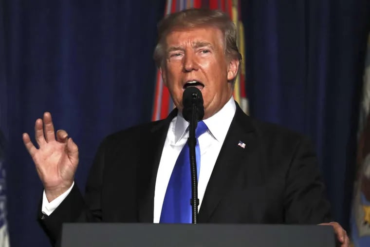 President Trump speaks at Fort Myer in Arlington, Va., on Monday.