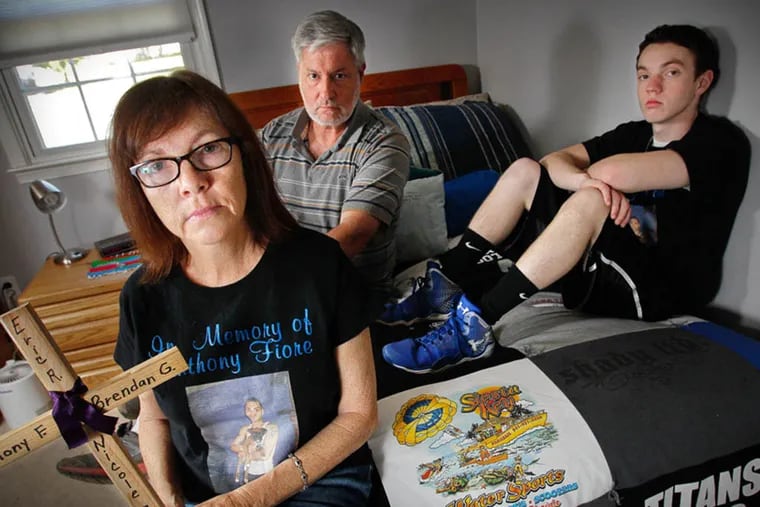 Valerie Fiore, with husband Cris and son Nic, lost oldest son Anthony to heroin. ALEJANDRO A.ALVAREZ / STAFF PHOTOGRAPHER