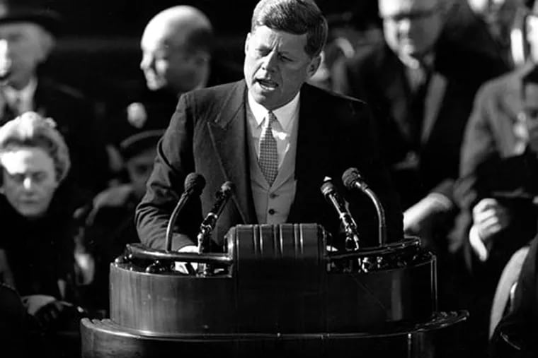 FILE - This Jan. 20, 1961 black-and-white file photo shows President John F. Kennedy delivering his inaugural address after taking the oath of office, on Capitol Hill in Washington. (AP Photo, File)