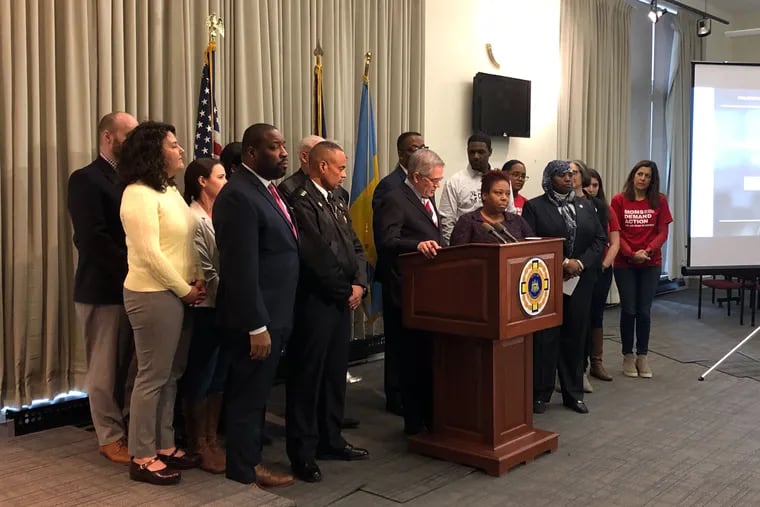 District Attorney Larry Krasner is accompanied by city officials including Police Commissioner Richard Ross, City Council President Darrell Clarke, and City Council member Kenyatta Johnson at news conference Wednesday, Jan. 23, 2019.