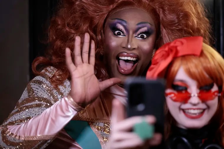 Sapphira Cristál (left) meets drag queen Aubrey Firedrill during her "RuPaul's Drag Race" season 16 premiere party at Brooklyn Bowl in Philadelphia on Friday.