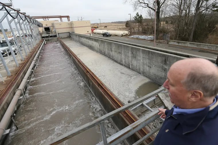 Dennis Palmer, executive director, looks over the area where grease is separated from wastewater at Landis Sewerage Authority in Vineland, N.J., on February 7, 2019. The facility makes more energy than it uses through a series of initiatives that include solar, wind, recapturing methane, and others. It even has its own farm fertilized by biosolids, and sells the hay it grows. It also has arrangements to take in grease from a meatball plant and convert it to energy.
