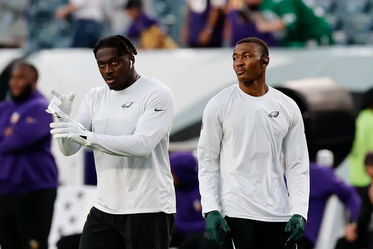Wide receivers A.J. Brown (left) and DeVonta Smith during warmups before the Eagles played the Minnesota Vikings on Sept. 14.