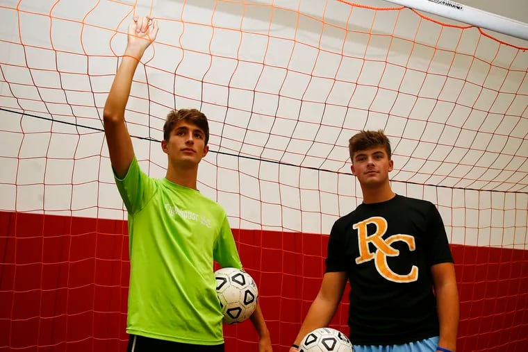 Roman Catholic soccer players -- and brothers -- Jimmy (left) and Kevin Tobin want to win a Catholic League title like their older brother, Mark, did. Jimmy Tobin is a junior midfielder, and Kevin Tobin is a senior goalie.