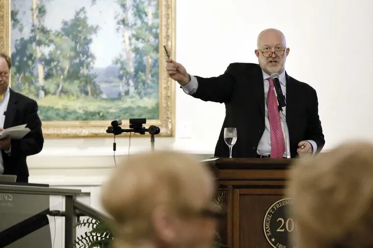 Freeman’s auctioneer Alasdair Nichol directs the bidding during the auction of items from the estate of Dorrance H. “Dodo” Hamilton at Freeman’s auction house in Philadelphia on Sunday.