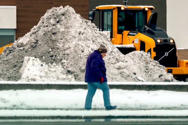 A sight not seen in the region for a few winters, a plowed snow mountain in a parking lot along Aramingo Avenue in Port Richmond Tuesday, Jan. 16. 2024 after the historic snow streak ended on the 716th day.