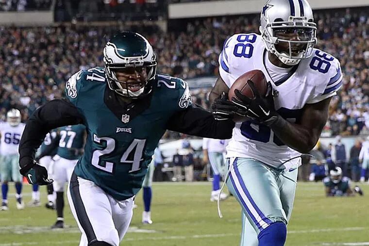 The Cowboys' Dez Bryant catches a touchdown pass past Bradley Fletcher. (David Maialetti/Staff Photographer)