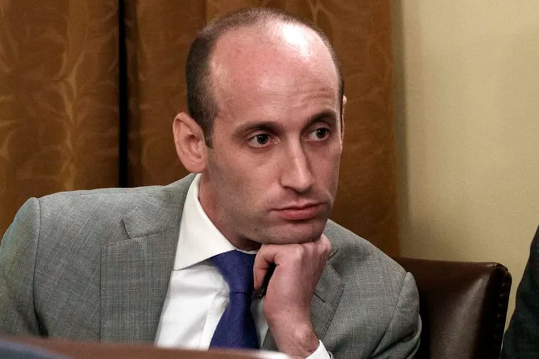 In this June 21, 2018 file photo, White House senior adviser Stephen Miller listens as President Donald Trump speaks during a cabinet meeting at the White House in Washington.
