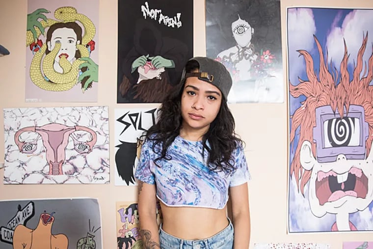 The artist known as Distortedd photographed in her home studio in West Philadelphia. ( Colin Kerrigan / Philly.com )