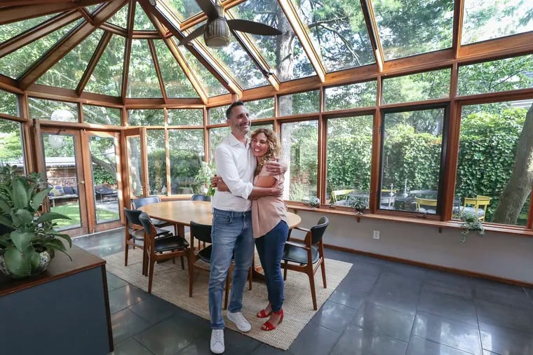 The glass gazebo dining room is a favorite spot for Mike and Daphne Hawkins Parker in their West Philadelphia Victorian. "It's a hard room to leave," Daphne says.