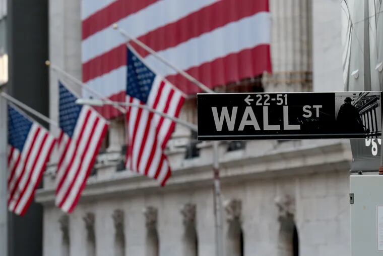 The Wall Street sign outside the New York Stock Exchange.