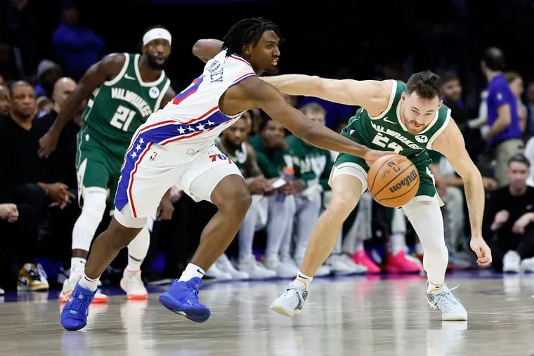 Sixers guard Tyrese Maxey steals the ball from Milwaukee's Pat Connaughton in the second quarter.