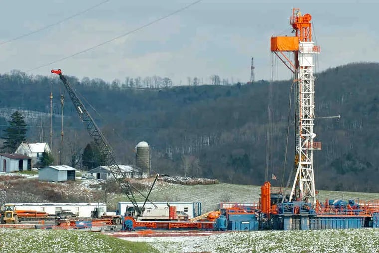 A drill rig sits in Dimock, Pa. , where the gas drilling debate has taken center stage. A water rig in the city exploded last September, caused by methane from a gas well.