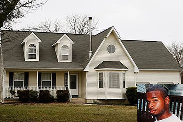 The home of the Mobley family in Buena, N.J., where terror suspect Sharif Mobley, 26, (inset) grew up. (AP Photos)