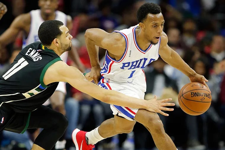 Ish Smith steals the ball from the Bucks' Tyler Ennis.
