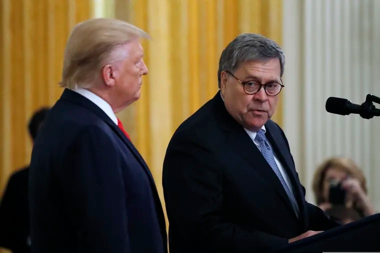 In this Monday, Sept. 9, 2019, file photo, Attorney General William Barr speaks as President Donald Trump listens during a ceremony in the East Room of the White House, in Washington.
