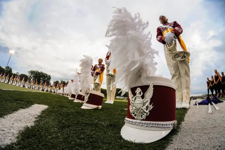 Members of the Cadets, an elite drum corps based in Allentown, Pa. practice in 2014. (KYLE MONROE / For The Inquirer)