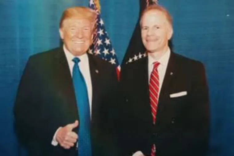 Former U.S. Attorney Bill McSwain's TV commercials in his bid for the Republican nomination for Pennsylvania governor feature this photo with former President Donald Trump when the ads appear on Fox News. But the picture is cut from commercials airing on broadcast TV stations.