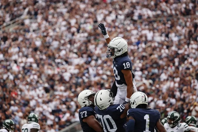 Omari Evans (#18) of the Penn State Nittany Lions celebrates with teammates after scoring a touchdown against the Ohio Bobcats during the second half at Beaver Stadium on September 10, 2022 in State College, Pennsylvania. (Photo by Scott Taetsch/Getty Images)