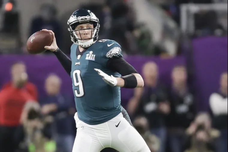 Eagles quarterback Nick Foles throws the football against the New England Patriots in Super Bowl LII on Sunday, February 4, 2018 in Minneapolis. YONG KIM / Staff Photographer