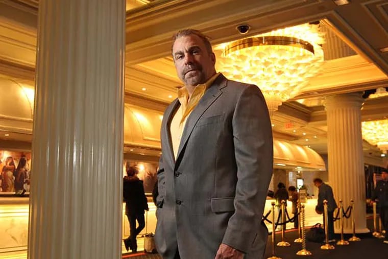 Atlantic Club chief financial officer, Michael Frawley, head of the smallest gambling hall at the seaside resort stands in the hotel lobby of his resort.  They seem like strange bedfellows, but with Gov. Christie weighing on whether to sign off on legalizing Internet gaming in the Garden State, it all makes sense. Rational Group US Holdings, the parent company of PokerStars and Full Tilt Poker, is asking New Jersey casino regulators for permission to buy the tiny Atlantic Club . Atlantic Club chief financial officer, Michael Frawley, head of the smallest gambling hall at the seaside resort - and its workforce of 1,700.   ATLANTIC01   01/30/2013 ( MICHAEL BRYANT / Staff Photographer  )