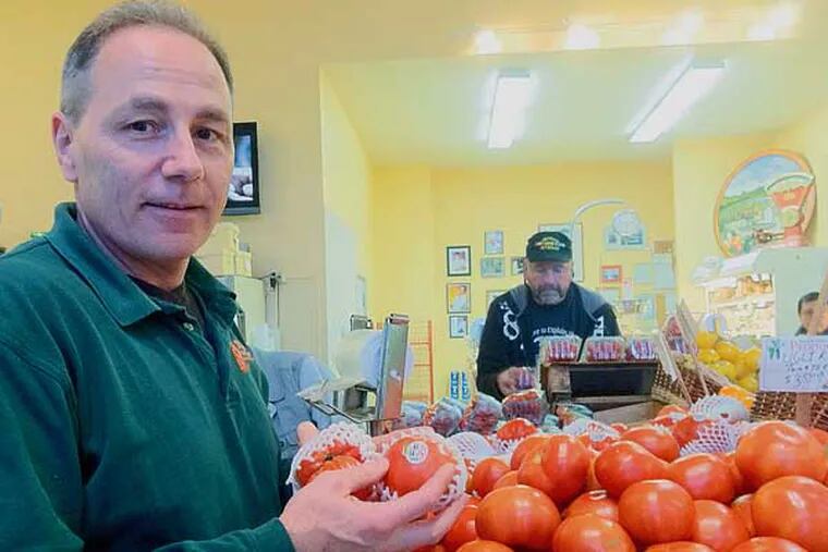 Democrat Vince Mazzeo, 49, won last week's recount of the Second District Assembly race by 39 votes over Republican incumbent John Amodeo. But he still checks on the quality of the produce six days a week as co-owner of B.F. Mazzeo, a grocery in Northfield where he is also mayor. (Staff Photo By Suzette Parmley)
