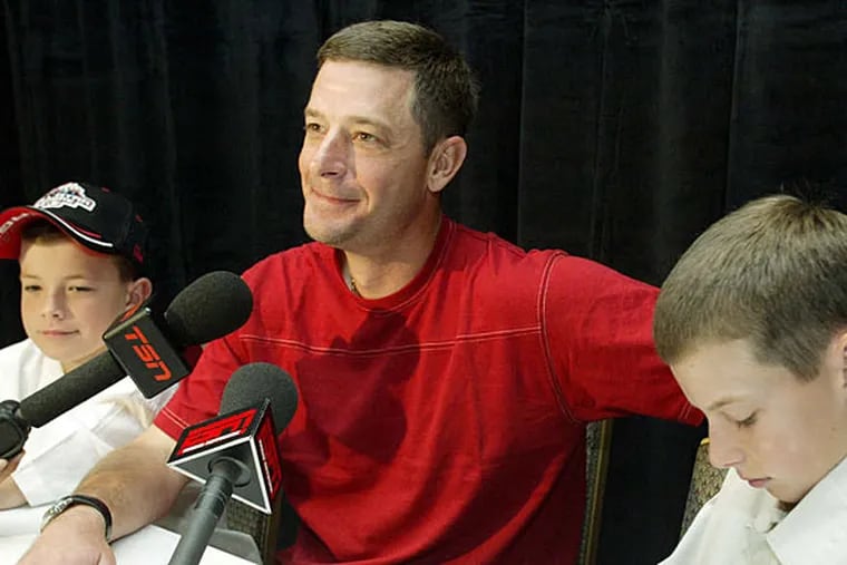 Jamie Moyer's career included making the American League All-Star team at age 40 in 2003 as a Seattle Mariner. The game was played in Chicago, where he was joined by sons Hutton (left), then 10, and Dillon, then 12.