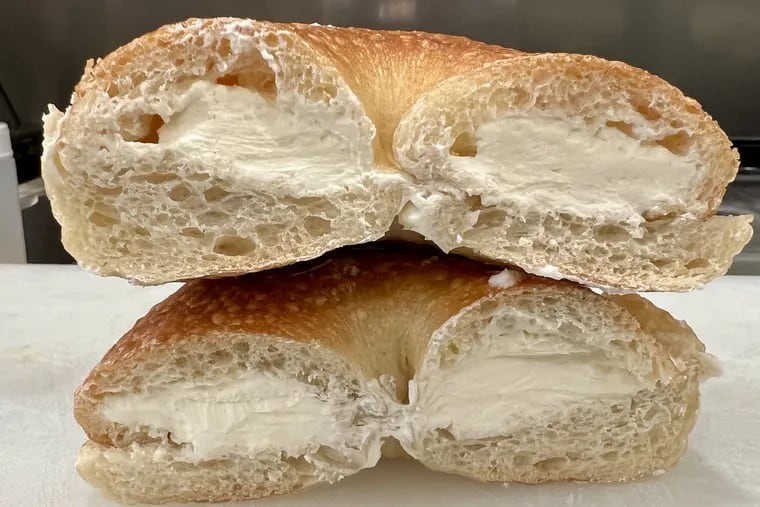 A scooped bagel with cream cheese at Slice & Schmear, 1700 S. 10th St.
