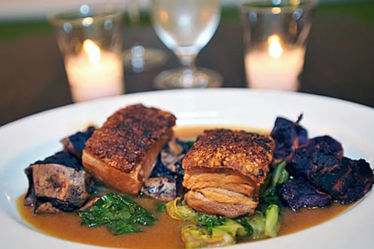 Braised Berkshire pork belly, a tender, juicy stack with savory depth. Chef Lee Styer’s enterprise has added diversity and style to the East Passyunk scene. (SHARON GEKOSKI-KIMMEL / Staff Photographer)