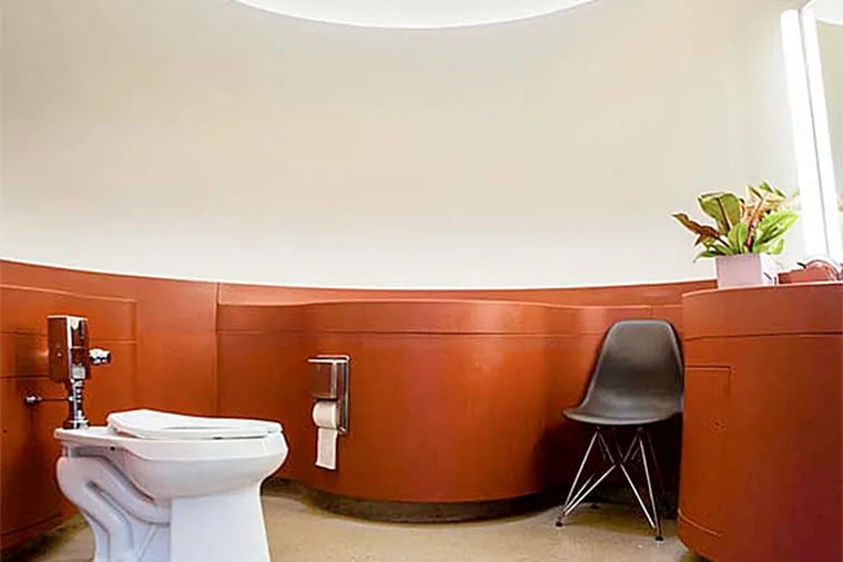 Skylights, solar-powered fixtures, sleek design, plus hygiene and usability, help make Longwood Gardens' America's best bathrooms.
(Matthew Hall/Staff Photographer)