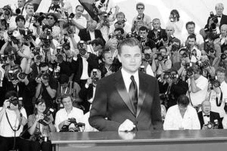Leonardo DiCaprio poses at Cannes Film Festival on Saturday.