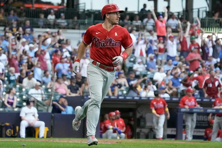 Phillies catcher  J.T. Realmuto  rounds the bases after hitting a home run against the Milwaukee Brewers on Sunday.