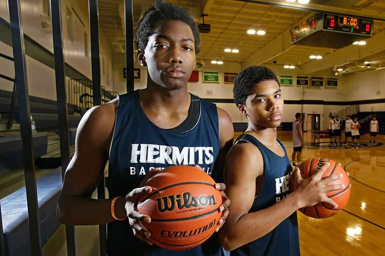 Junior forward Justyn Mutts, left, and senior guard Sa'eed Nelson will be leading St. Augustine basketball team.