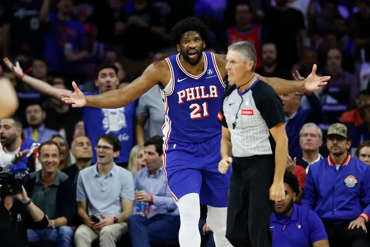 Sixers center Joel Embiid arguing a foul call by referee Scott Foster during Game 6 against the New York Knicks.