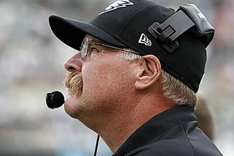 Eagles head coach Andy Reid watches a replay during a challenge in the fourth quarter. (David Mailetti/Staff Photographer)